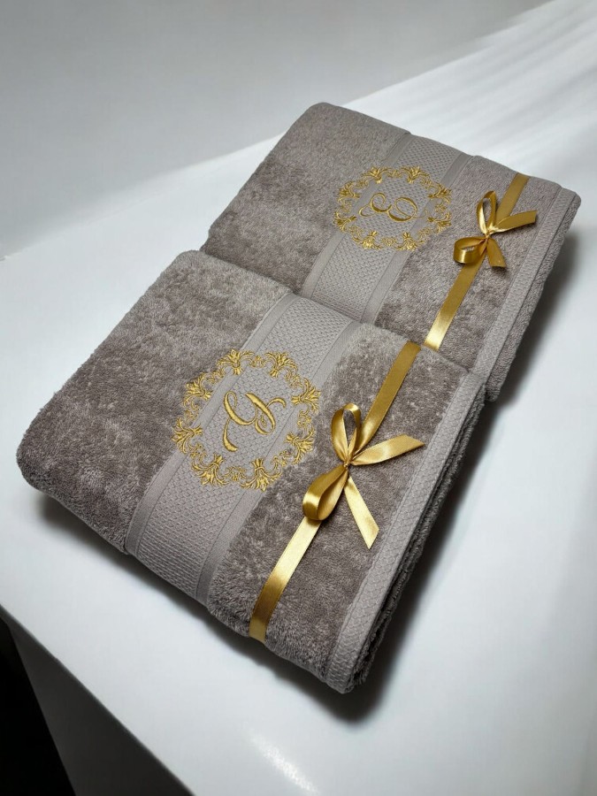 Rankšluostis su inicialiu "Elegancija"