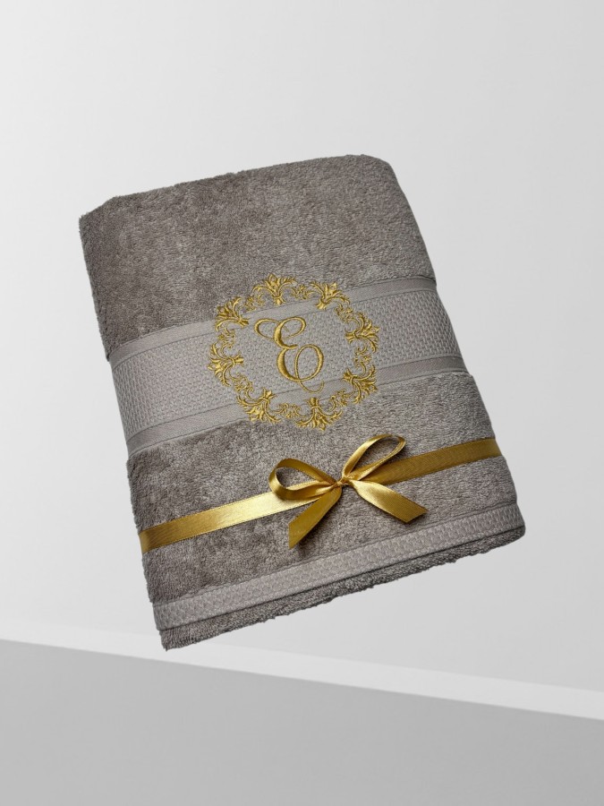 Rankšluostis su inicialiu "Elegancija"