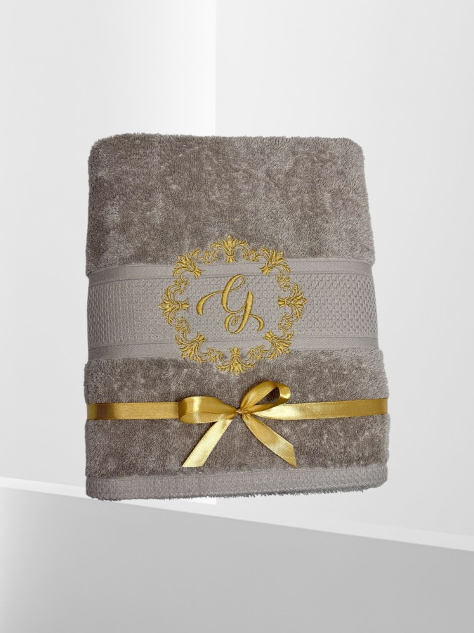 Rankšluostis su inicialiu "Elegancija"